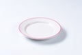 Empty rimmed dinner plate Royalty Free Stock Photo