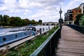 Empty Riverside Boardwalk Next To River Thames With No People Or Tourists