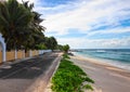 Empty road along the ocean`s beach, Mahe, Seychelles