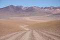 Empty road in Atacama Desert in Bolivia Royalty Free Stock Photo