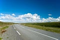 Empty road with a beautiful blue sky in horizon Royalty Free Stock Photo