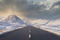 Empty road blank horizon dramatic winter snow at sides in Scottish highlands at Glencoe Rannoch Moor Buachaille Etive Mor Mountain Royalty Free Stock Photo