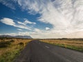Empty road with a blue cloudy sky, Iceland Royalty Free Stock Photo