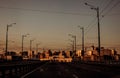 Empty road city and buildings sunlight sunset Royalty Free Stock Photo