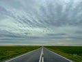 Empty road in Dobrogea with blue sky