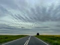 Empty road in Dobrogea with blue sky