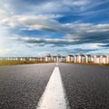 Empty road. Entry into the city at sunny day Royalty Free Stock Photo