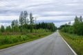 An empty road in Finland during a long evening