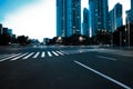 Empty road surface with city landmark buildings of evening