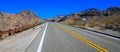 Empty road with mountains behind in Arizona, USA Royalty Free Stock Photo