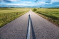 Empty road with a shadow in the shape of arrow Royalty Free Stock Photo