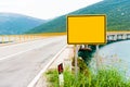 Empty road sign before the bridge Royalty Free Stock Photo