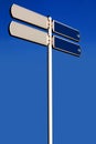 Empty road sign on a high pole Royalty Free Stock Photo