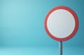 Empty road sign with red border, white center on light blue background. Represents choices, navigation, decision-making, future Royalty Free Stock Photo