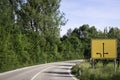 Empty road and street sign with direction arrows. Crossroad sign