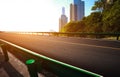 Empty road surface floor with city landmark buildings Royalty Free Stock Photo