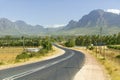 Empty road to Stellenbosch wine region, outside of Cape Town, South Africa Royalty Free Stock Photo