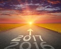 Empty road to upcoming 2017 at sunset Royalty Free Stock Photo