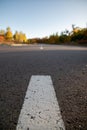 Empty road with the white traffic lines