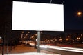 Empty roadside billboards at evening