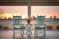 empty rocking chairs on a peaceful farmhouse porch at dusk Royalty Free Stock Photo