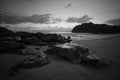 Empty rocky beach at dusk Royalty Free Stock Photo