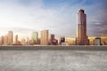 Empty rooftop floor with skyscrapers view