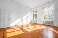 Empty room in beautiful flat with wooden floor - real estate in