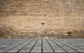 Empty room with bricks wall and tiled floor Royalty Free Stock Photo
