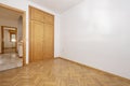 Empty room with built-in pine wood wardrobe Royalty Free Stock Photo