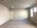 Empty room with carpet in a new house Royalty Free Stock Photo