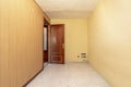 Empty room with ceramic stoneware floor and walls painted in light