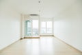 Empty room is decorated with an engineering wooden floor and wallpaper on the wall with sunlight from the window. Minimalist Royalty Free Stock Photo