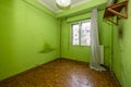 Empty room with dirty green paint and a mess of cables Royalty Free Stock Photo