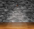 Empty room - granite stone decorative brick wall with lamp and laminate flooring interior background, interior template for Royalty Free Stock Photo