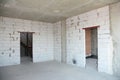 Empty room interior build with plastering wall, drywalls, stucco, metal door lintel Royalty Free Stock Photo