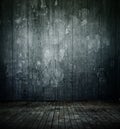 Empty room interior, old mottled concrete wall, dirty wooden floor Royalty Free Stock Photo