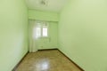 Empty room with light green painted walls and curtain Royalty Free Stock Photo