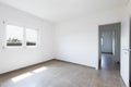 Empty room in a modern apartment with white walls, nobody in the scene Royalty Free Stock Photo