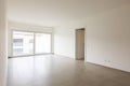 Empty room in a modern apartment with white walls, nobody in the scene Royalty Free Stock Photo