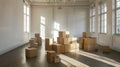 Empty room with numerous cardboard boxes, sunlight streams through large windows, creating shadows on the floor Royalty Free Stock Photo