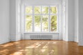 Empty room in old apartment building with  parquet floor and big Royalty Free Stock Photo