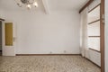 Empty room with old terrazzo floor, white walls and window Royalty Free Stock Photo