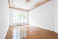 Empty room with parquet floor and stucco ceiling - new renovated Royalty Free Stock Photo