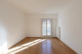 Empty room with parquet and window with view Royalty Free Stock Photo