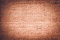 Empty room with red brick wall and wooden floor Royalty Free Stock Photo