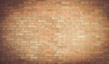 Empty room with red brick wall and wooden floor Royalty Free Stock Photo