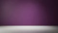 Empty room with a smooth purple wall and a light gray concrete floor, minimalist studio backdrop Royalty Free Stock Photo