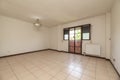 Empty room with square cream ceramic floor, dark red aluminum