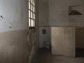Empty Room with a Toilet in an Old Prison